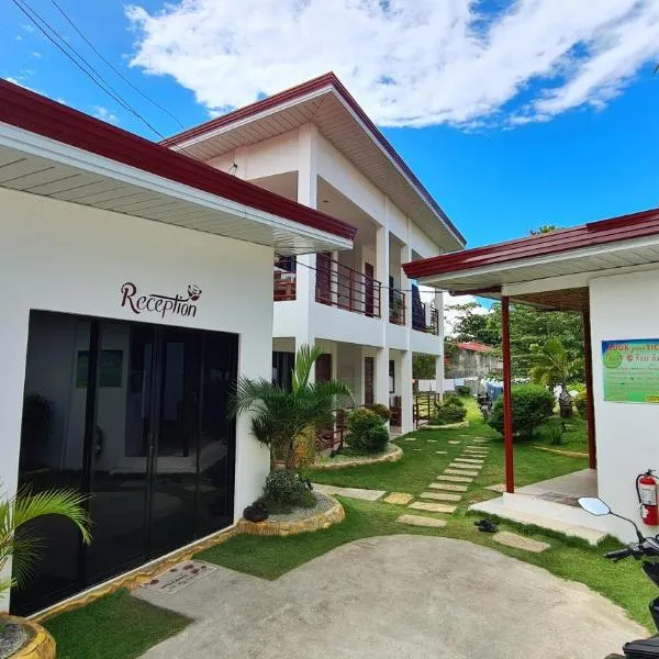Roos Guesthouse, hotel a Moalboal