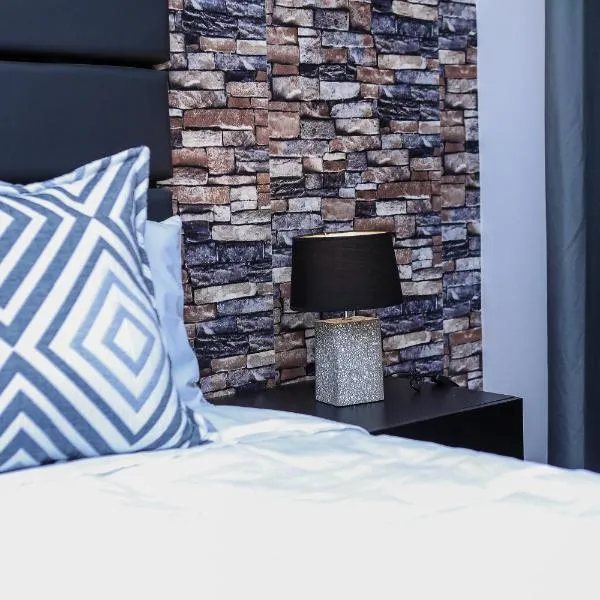 Delux Guesthouse, hotel a Volksrust