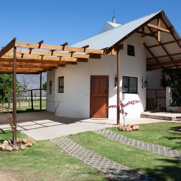 Rooikraal Farm Rondawel, hotel di Prince Alfred Hamlet