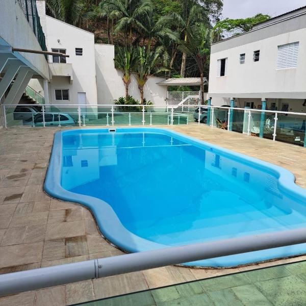 Casa nova com 3 quartos, equipada com Ar Condicionado, TV, Internet e Área de Lazer Completa - Boiçucanga