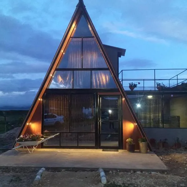 Glamping y Cabañas el Encanto-Girasoles, hotel v destinaci Tota