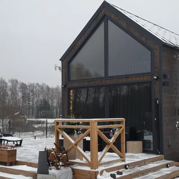 Domek Mazurski całoroczny nad jeziorem z Jacuzzi SPA, viešbutis mieste Pasym