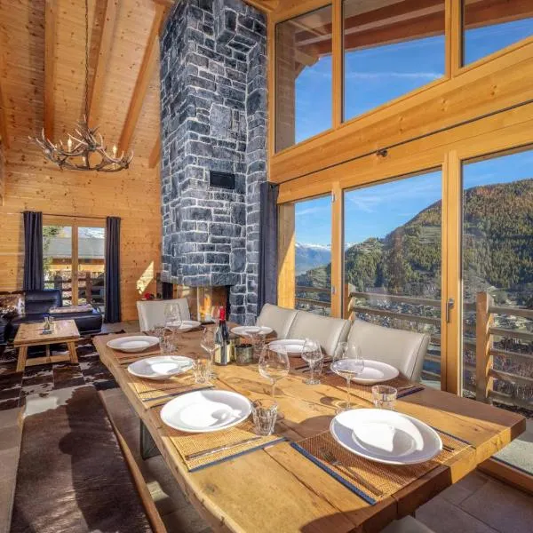 Chalet Amerhone - Luxury chalet With Jacuzzi, hotel in Riddes