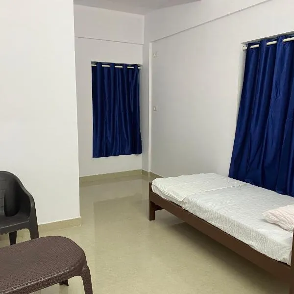 Erumely Central Homes, hotel v destinaci Mundakāyam