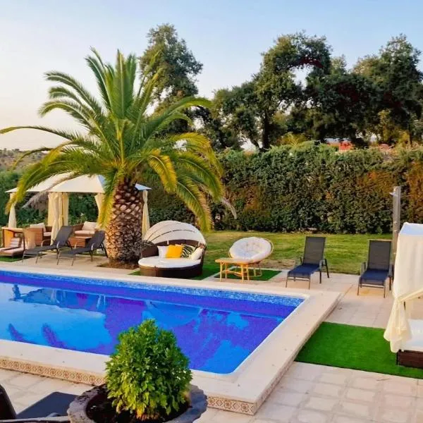 Casa Rural El Canto Del Agua, hotel in Malpartida de Plasencia