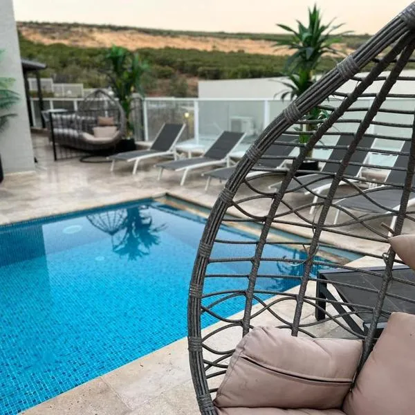 וילה מארי עם בריכה במגדל, hotel in Migdal