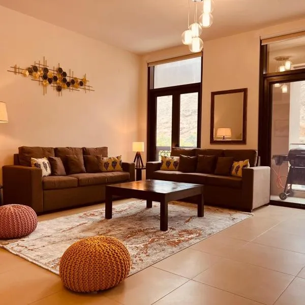 ONE 2BHK Elegant Apartment in Muscat Bay 03, hotel in Bandar Jişşah