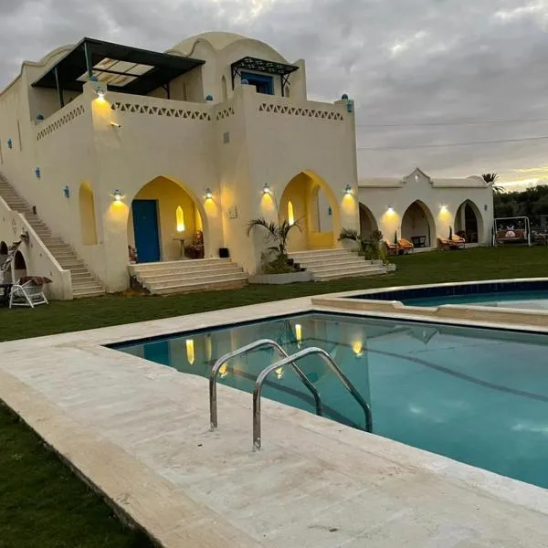 Lake House by Tunisia Green Resort, hotell i Qaryat at Ta‘mīr as Siyāḩīyah