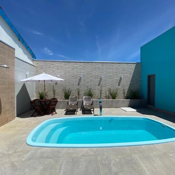 Casa Pé na Areia, Piscina, 3 quartos sendo 1 quarto com ar Split a 50 metros da praia - Foto 4