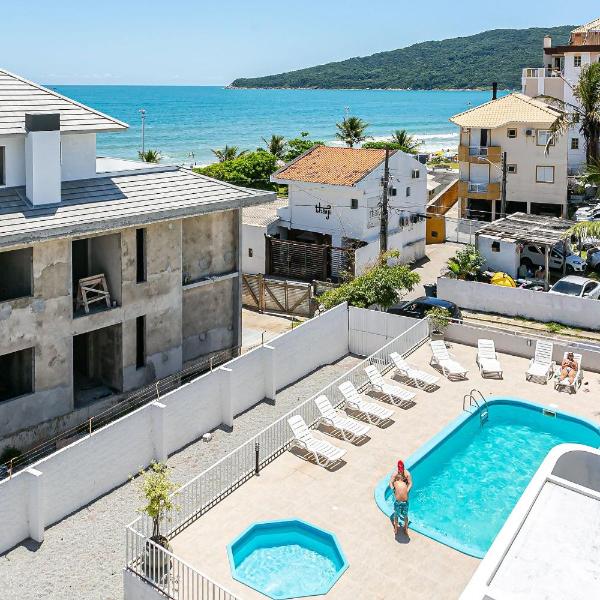 Prédio com apartamentos completos, com piscina e a passos da praia - Agua Marinha - Foto 4