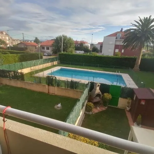 Apartamento céntrico con piscina y garaje, hotel v destinaci Suances