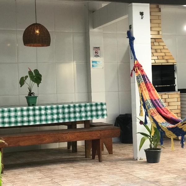 3 QUARTOS,10 min a pé Praia Grande, GARAGEM 3 carros, Churrasqueira, Wi-Fi e Cozinha Completa - Foto 2
