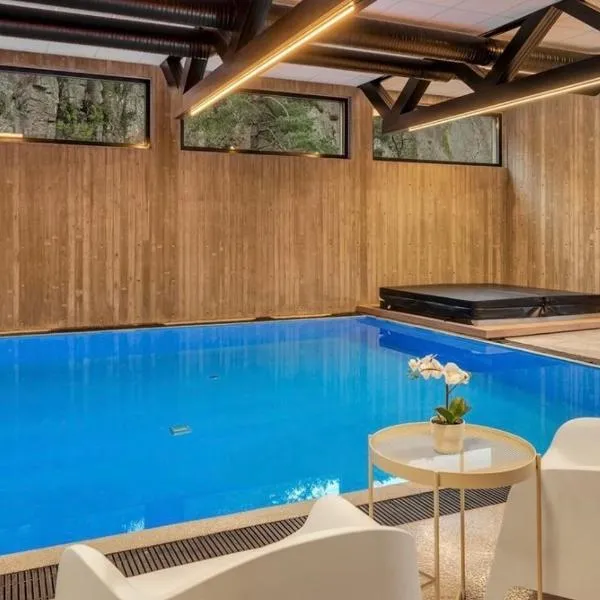Åros Beach Cabin with Pool, Jacuzzi and Sauna, viešbutis Kristiansande