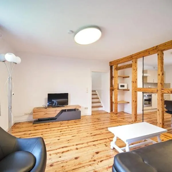 Großzügige Wohnung auf dem Hof Historischen Mühle, hotel in Holzhausen