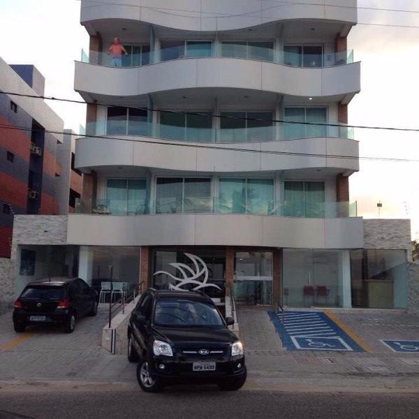 Flat com varanda beira-mar, apt 102