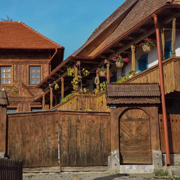 Székelyföld ,Siklódi Kő Vendégház, Tornácosház, hotel v destinaci Bartoştana