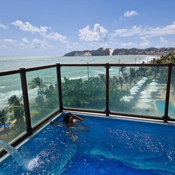 Na praia - Araça 407 Luxo - Lateral vista mar