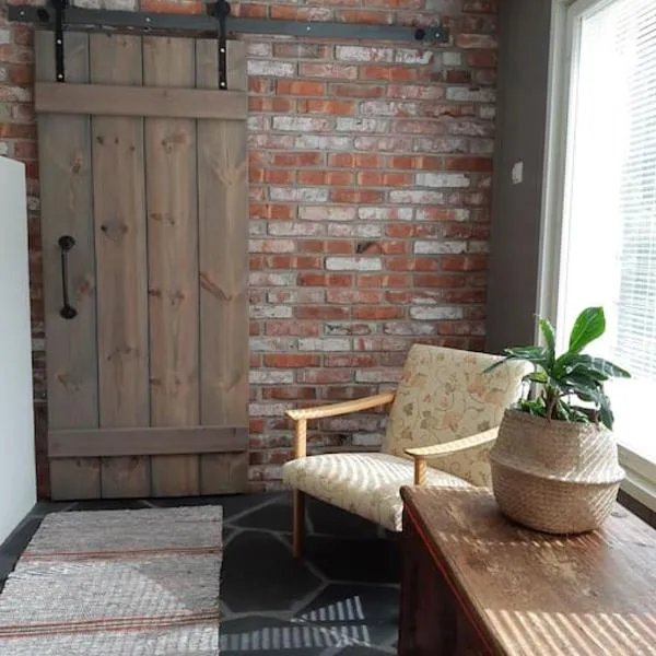 Alapihan Arboretumin vierasmaja ja sauna, hotel in Jakokoski