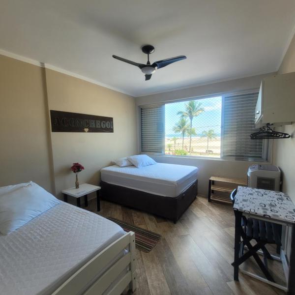 Apartamento Aconchego Frente Mar - Vila Guilhermina Praia Grande SP - Cozinha Completa - Climatizador de Ar - TV a Cabo - Wi-Fi - Foto 2