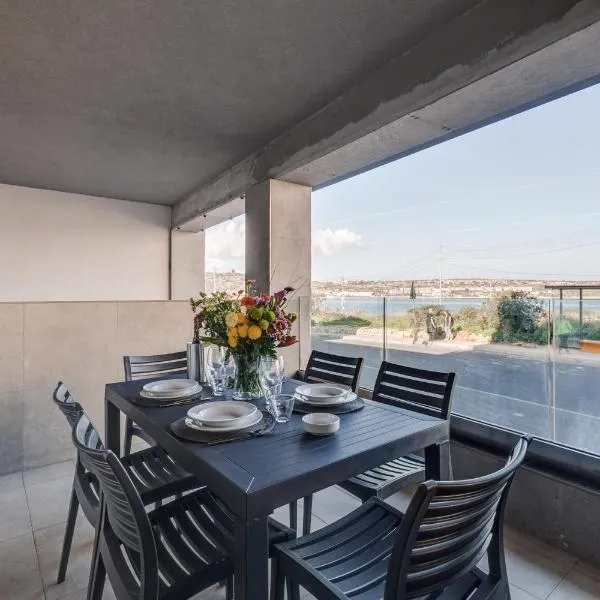 9ten11 Seafront By Homely, hotel in Mellieħa
