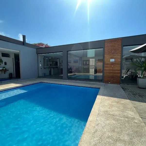 Pousada Cadiz - Piscina Climatizada, hotel in Bertioga