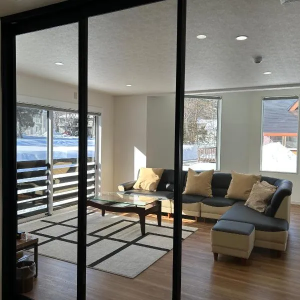 Hakuba Sunrise Apartments, ξενοδοχείο στη Χακούμπα