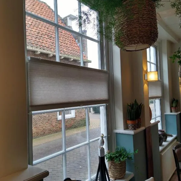 Bed & Brasserie Het Kosthuys, hotel v destinaci Sint Maartensdijk