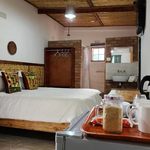 Nxabii Cottages, hotel em Kasane