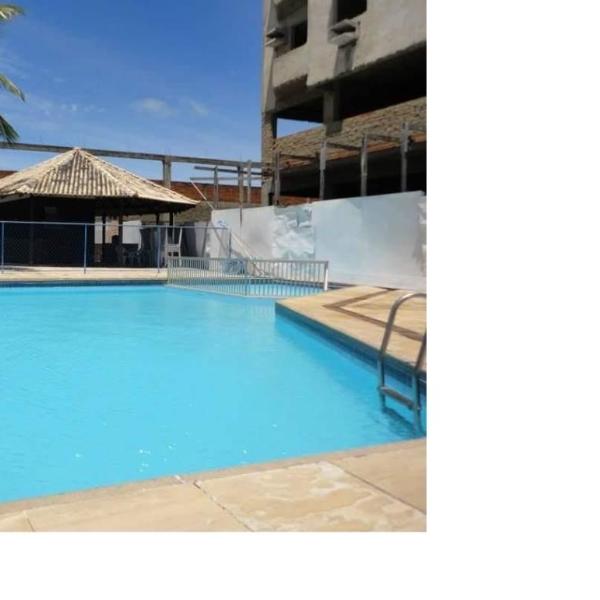 Apartamento com piscina 15 mim da Praia