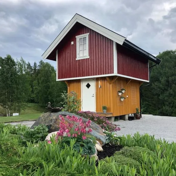 Unik overnatting i Stabbur/Minihus, hotel in Ulefoss