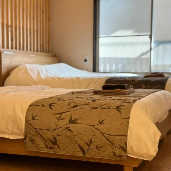 巡, hotel v Osace