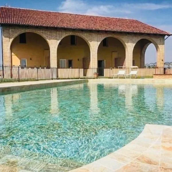 Villetta verde Smeraldo fronte piscina, ξενοδοχείο σε Vignale