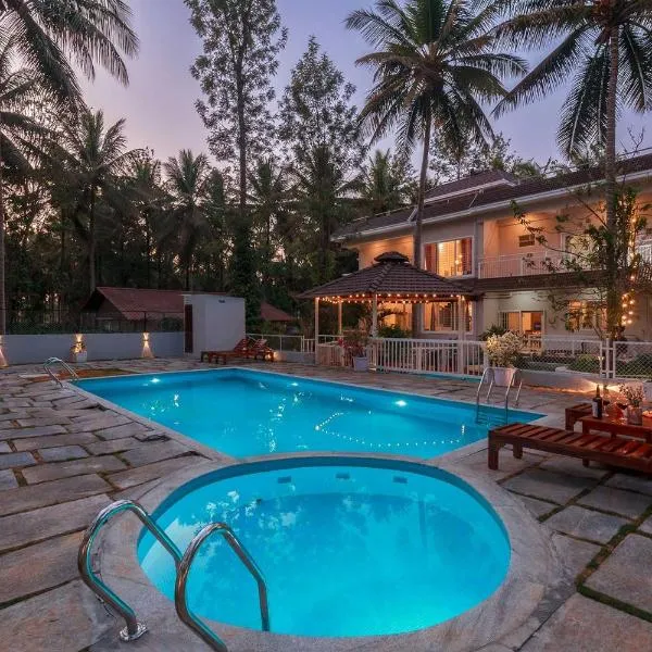 StayVista at Bask In The Greens Coorg with Private Pool, hotel a Madikeri