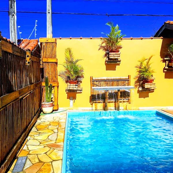 Casa linda com Piscina e Jogos, pertinho da Praia