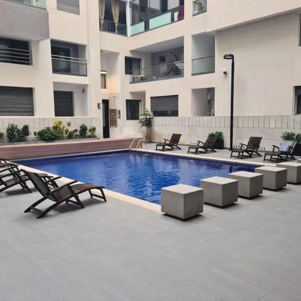 luxe appartement met zeezicht en zwembad Mohammedia Parc, hotel din Mohammedia
