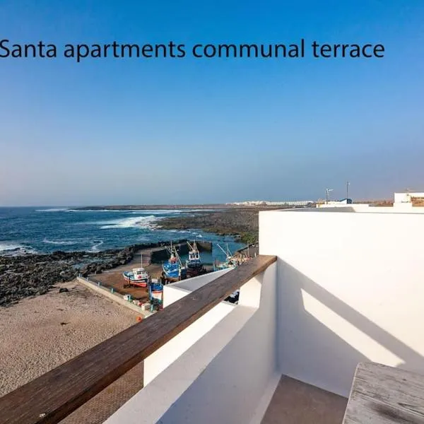 Weybeach2 -shared terrace,plaza view,sea frontline, hotell i La Santa