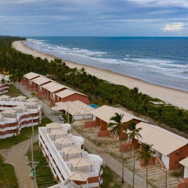 Apto em condomínio na praia, com terraço, em Ilhéus-BA