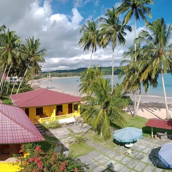 Harus Damai Inn, hotel in Telukdalam