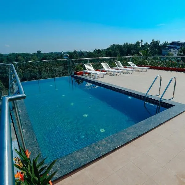 ์ ํ ๋ฐํ
๋ฆฌ์ ์์นํ ํธํ
Hotel Saffron Wayanad