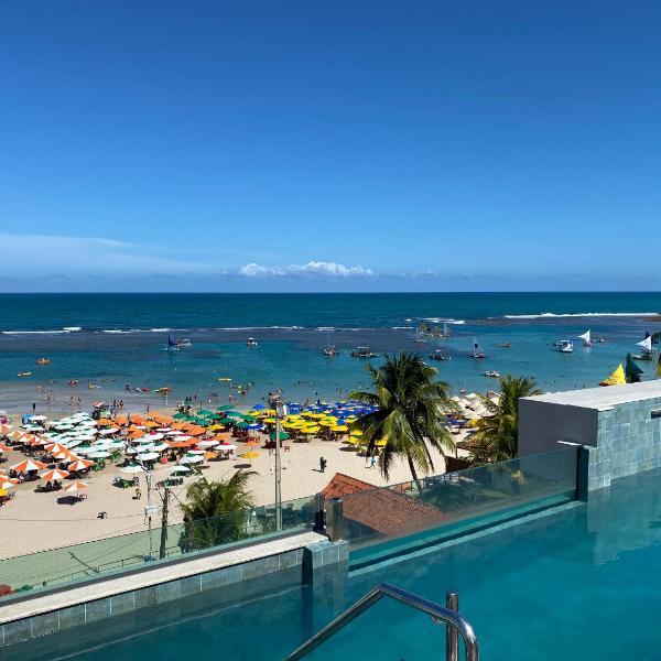 Flat beira mar com varanda em Porto de Galinhas