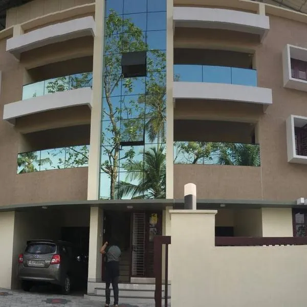 Athrakkattu Enclave 6 Bedroom Luxury Apartment, hotel di Kallār