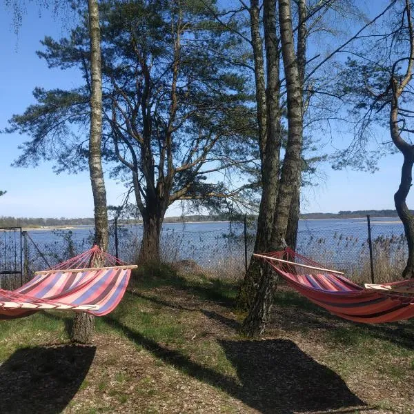 Linia brzegowa prywatny pomost własny kajak hamaki grill ognisko kominek w domu taras Domek dla 6 osób nad samą wodą BRZÓZKI 1, khách sạn ở Barkowice