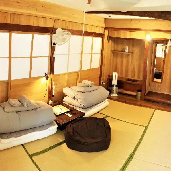 奄美ゲストハウス HUB a nice INN, ξενοδοχείο σε Setouchi