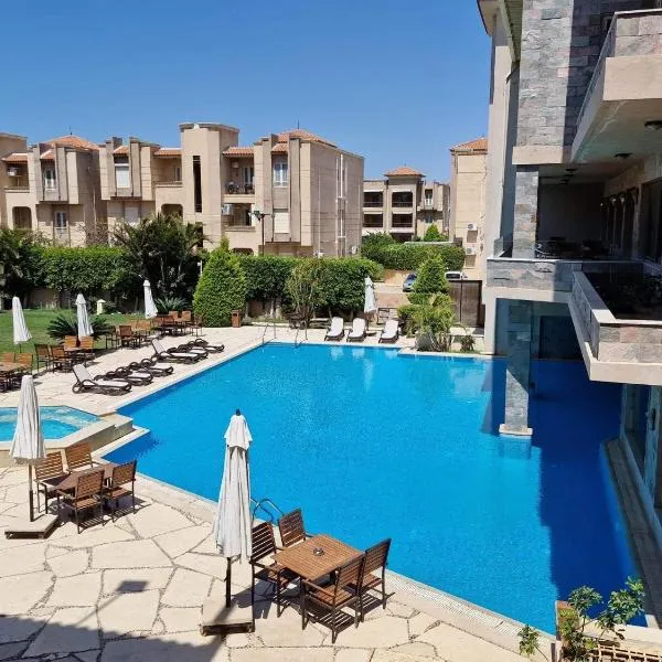 Panacea Suites Hotel, hotel di Borg El Arab