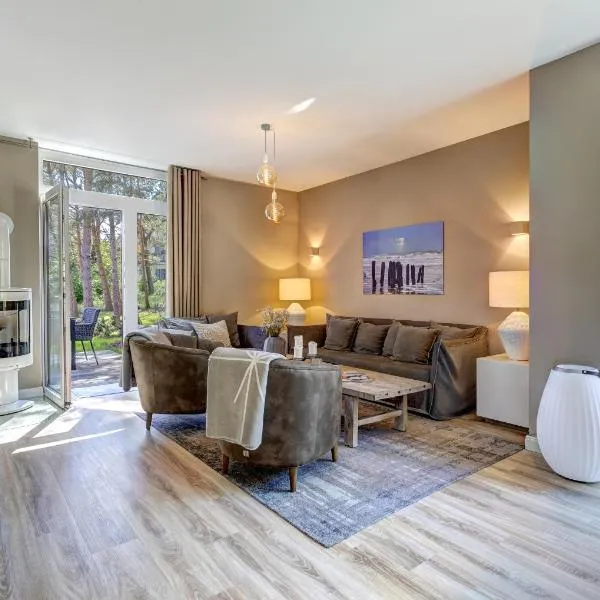 Ferienhaus Lodino Lodge mit Sauna und Kamin, hotel in Loddin