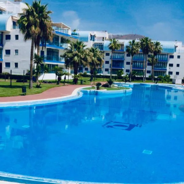 Atico lujo primera linea, terraza, piscina, parking, hotel in Castillo de Baños