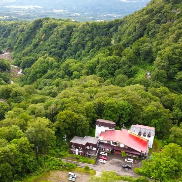 Tsubame Highland Lodge燕ハイランドロッジ، فندق في ميوكو