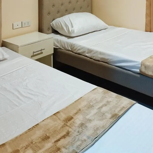 RedDoorz @ Benelio Suites Pavia Iloilo, hotel v destinaci Pavia