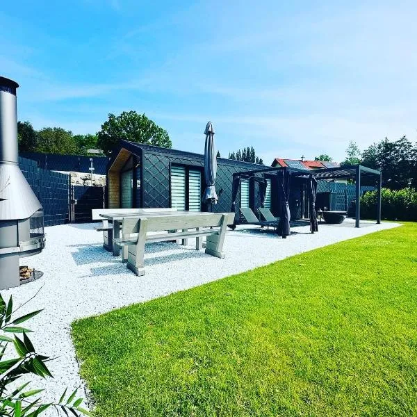 Voralpen Lodge - Ferienhaus mit Gym & Wellnessbereich, hotel v destinaci Traisen