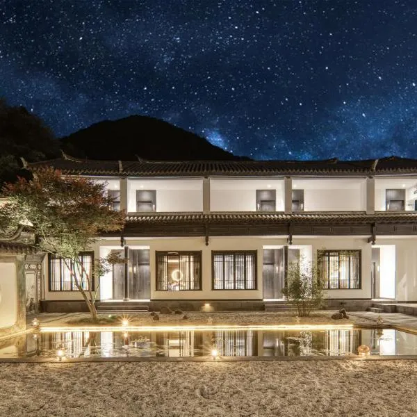Gong Xili Qingdu Hotel, hotel en Longpan